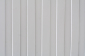 Obraz premium metal striped gray fence. background, texture.