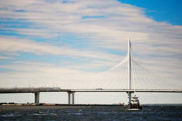 Obraz premium St. Petersburg, Russia - June 28, 2017: Automobile bridge over the bay in St. Petersburg.