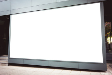 Fototapeta premium Mock up of store blank showcase window in a city