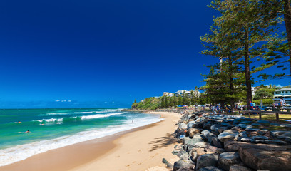 CALOUNDRA, AUS - DEC 06 2015: Hot sunny day at Dicky Beach Calundra, Queensland, Australia