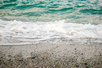 Turquoise waters, fine sand and small waves lapping at the shore