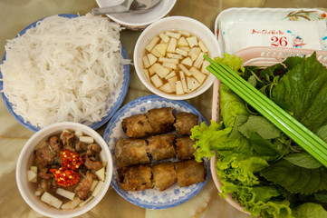 Grilled pork rice noodles and herbs, vietnamese cuisine. Us President, Obama used to try this food in Ha Noi when visiting Vietnamese Capital in 2016.