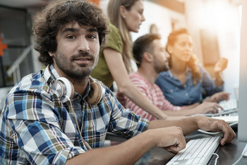 Startup entrepreneur working on desktop in office