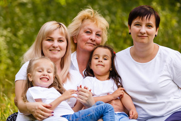 Grandmother daughter and granddaughter In Park