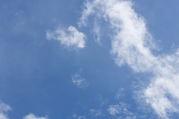 Obraz premium Clouds are divided into layers in the evening with light.