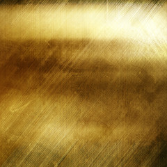 Grunge gold metal background with cracks and scratches