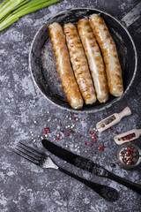 sausages on the grill