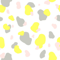 Abstract seamless chaotic pattern. Modern wallpaper in trendy pastel colors. Yellow, gray and pink . Background texture with spots and blots. Repeat endless design. Vector.