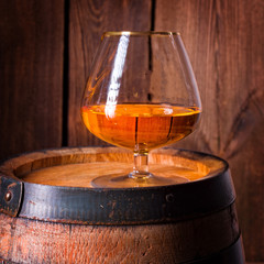 delicious bourbon on a wooden barrel