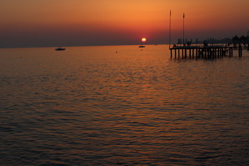 sunset on the beach, romantic time, lovelu sky, ocean, dusk, clouds, romantic, lovely , bridge, colors, 