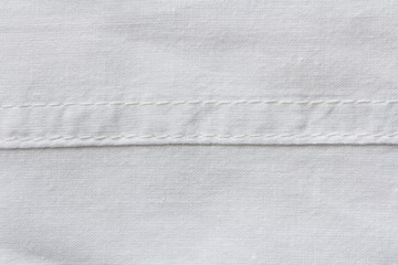 White natural cotton cloth texture with horizontal seam