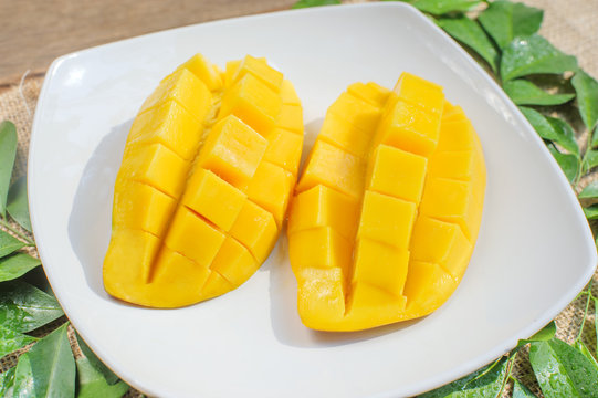 fresh mango fruit put on the sack fabric background