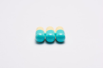 Pills on white background