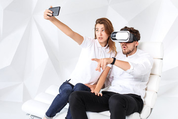 Couple having fun playing with virtual reality