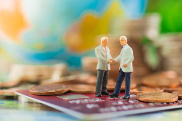 Businessmen join hands to agree to do business together