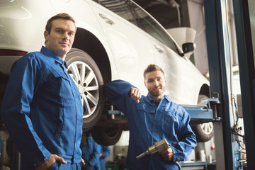 Fototapeta na wymiar Excellent local mechanics repairing clients car