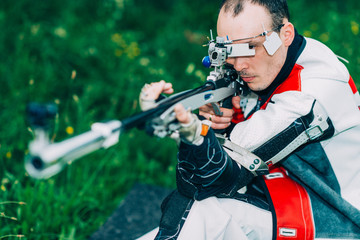 Male training sport shooting with free rifle