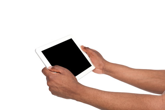 Holding and pointing to blank screen on tablet