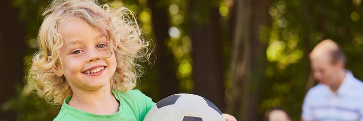 Kid with soccer ball © Photographee.eu