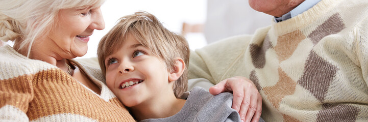 Grandma hugging her grandson © Photographee.eu