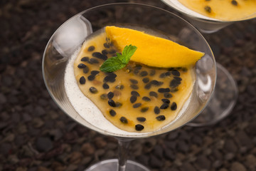 Panna cotta dessert with passion fruit and mint