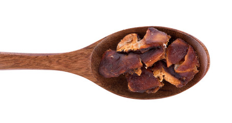 Tamarind in spoon on the white background
