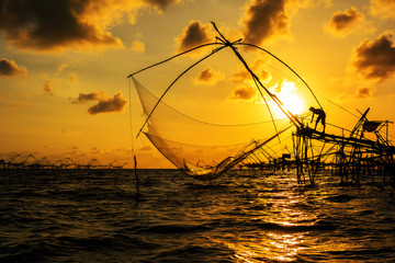 Fototapeta na wymiar Anything light of the morning sun on the lives of fishermen in Thailand.