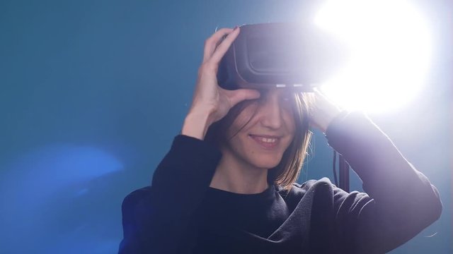 Young Woman using the virtual reality headset