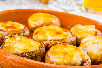 Mushrooms baked with cheese