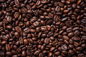 Texture of roasted ready to drink coffee close-up.Coffee Bean Scene.BlackGround Coffee.