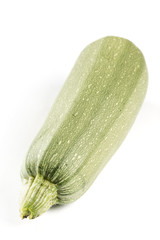 Whole fresh zucchini isolated on the white background