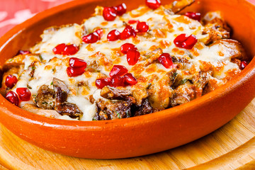 Meat and eggplant baked with cheese