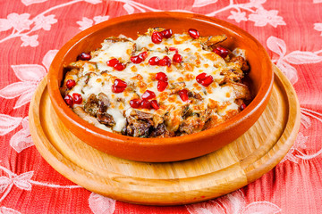 Meat and eggplant baked with cheese