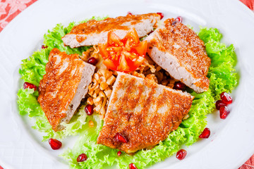 Fried minced beef with bulgur on white plate. Armenian food. Kofta