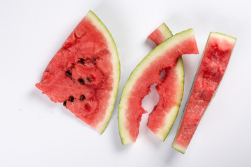 Watermelon leftovers isolated above white background