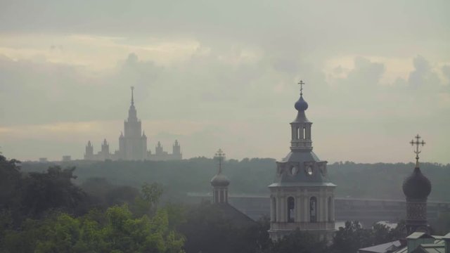 Rain in Moscow. View to church and university