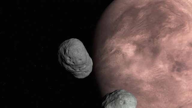 An asteroid is passing by and almost colliding with Mars moon Phobos
