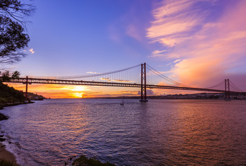 Naklejka na ściany i meble Lisbon and 25th of April Bridge - Portugal