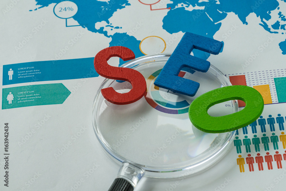 Aufkleber search engine optimization concept as colorful alphabet abbreviation seo on magnification glass on p