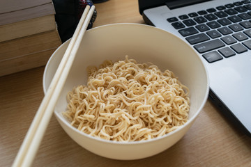 noodles on table wood background with in working