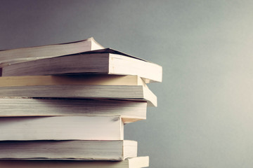 The book is on a wooden table with filter effect retro vintage style