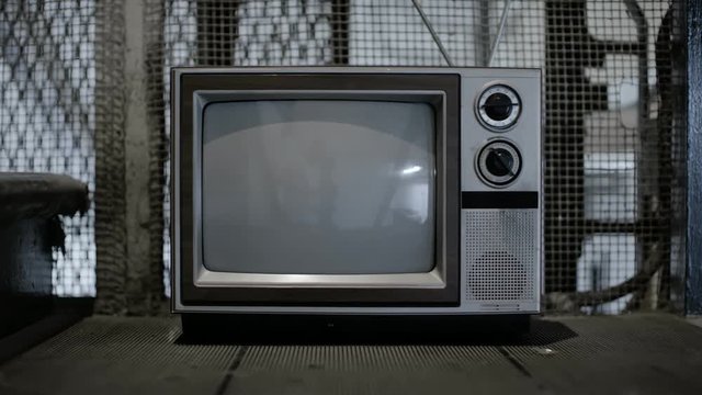 Vintage television in freight elevator