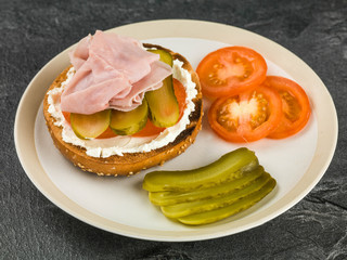 Ham Tomato and Cheese Spread Sesame Bagel With Gherkins