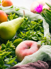 Fresh summer fruit concept still life - peaches, apricots and pears