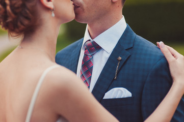Wedding couple on a walk bride and groom sea field sunset architecture grass sand