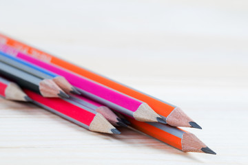 Pencils on a wooden table. Back to school