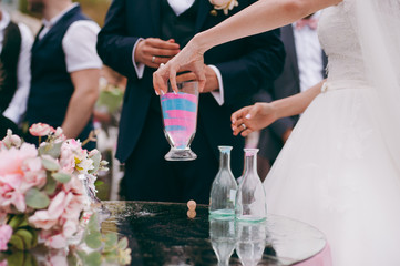Blending of the sands at wedding ceremony