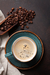 Obraz na płótnie Canvas Coffee cup on old kitchen table