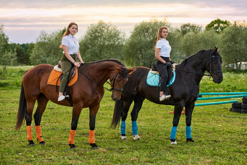 Pretty young girls jockey and their horses