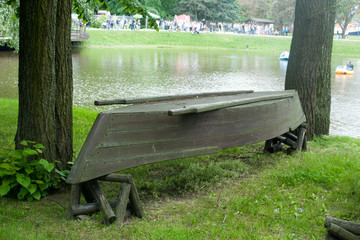 Old upturned rowboat on the shore.